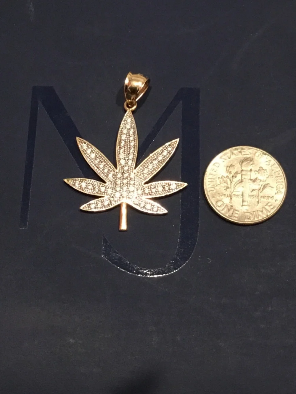 14 kt gold pendant marijuana leaf cz stones iced out 4 grams